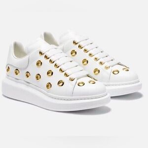 $950 ALEXANDER MCQUEEN .....SNEAKERS gold and white